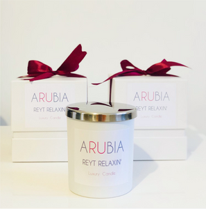 White jar luxury scented candle in white gift box with pink and grey logo and red / pink bow.