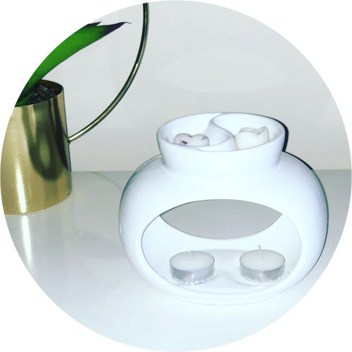 Oval double wax burner in white. 