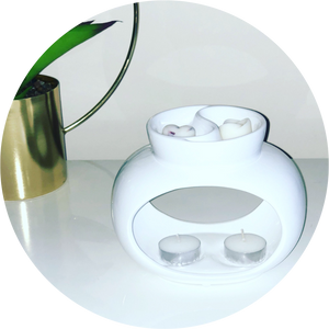 Oval double wax burner in white. 