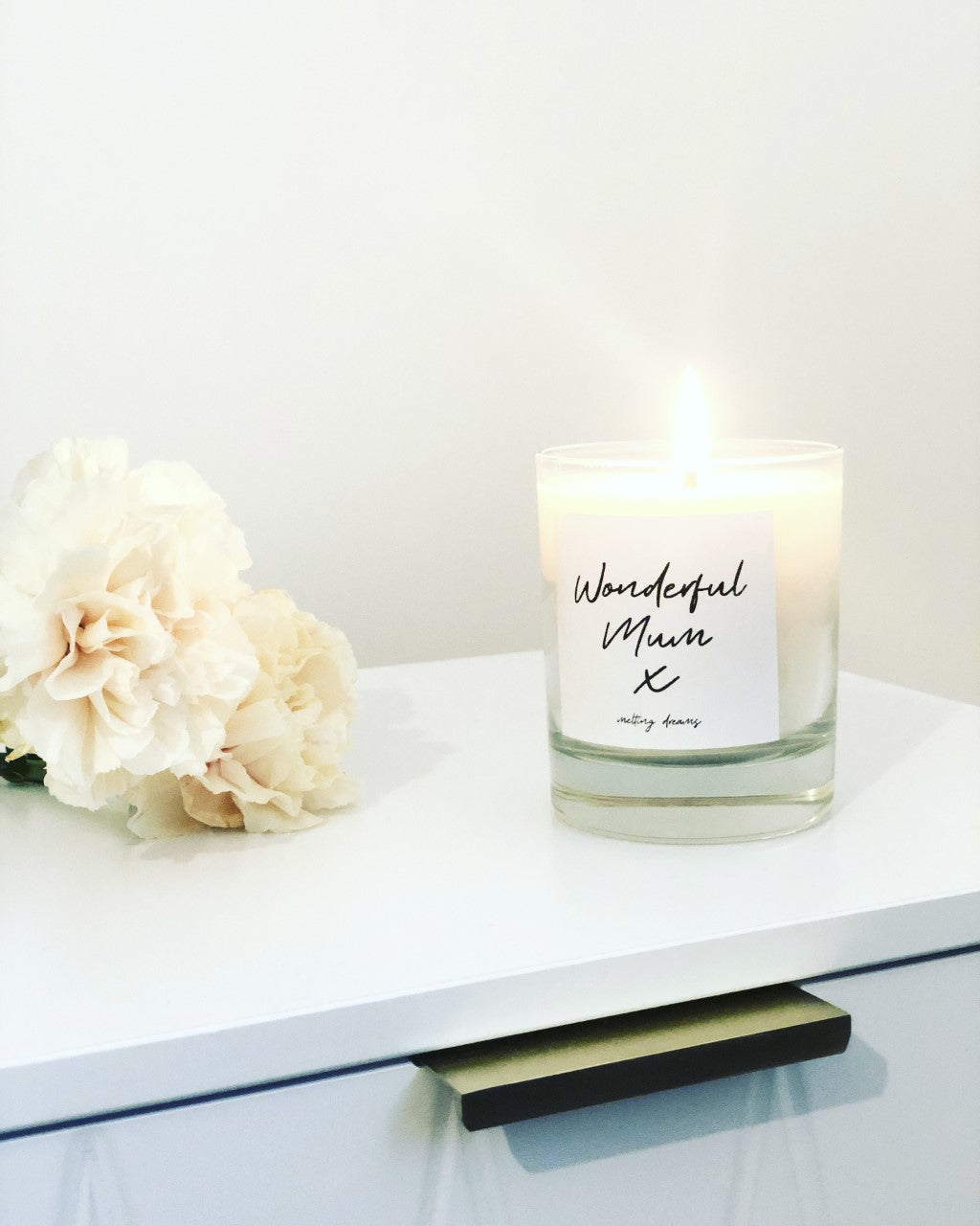 Relax luxury wonderful mum candle with black text. 